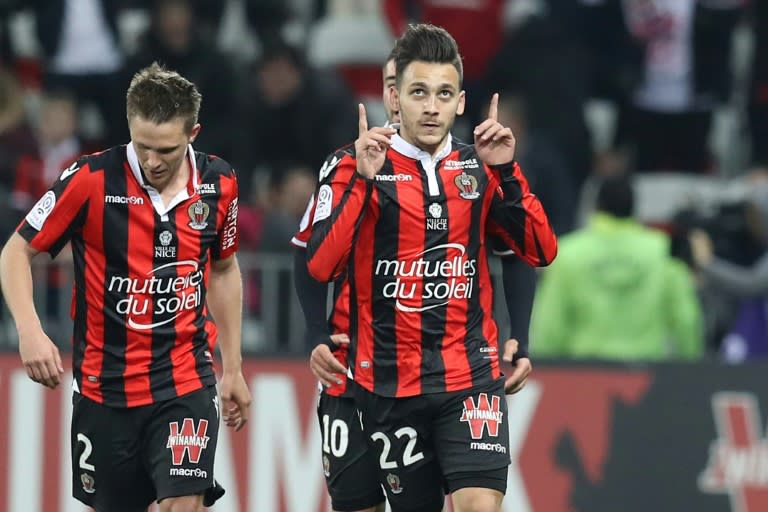 Nice's Anastasios Donis (C) celebrates after scoring a goal against Caen on March 10, 2017 at the Allianz Riviera stadium in Nice, southeastern France