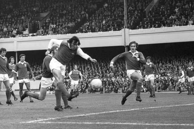 Ray Kennedy shoots towards the Ipswich goal during his time at Arsenal