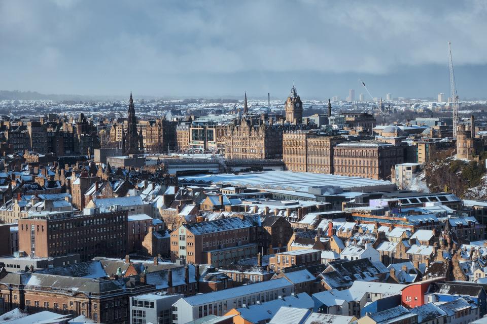 Top view of the winter city of Edinburgh covered snow