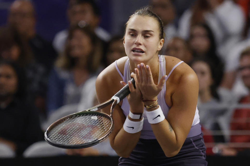 Aryna Sabalenka, of Belarus, reacts during her match against Caroline Garcia, of France, in the singles final of the WTA Finals tennis tournament in Fort Worth, Texas, Monday, Nov. 7, 2022. (AP Photo/Ron Jenkins)
