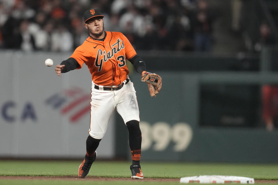 San Francisco Giants shortstop Thairo Estrada throws out New York Mets' Brett Baty at first base during the sixth inning of a baseball game in San Francisco, Friday, April 21, 2023. (AP Photo/Jeff Chiu)