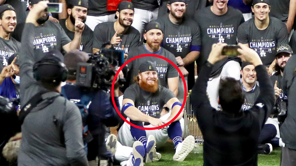 Justin Turner, pictured here posing for photos without a mask on.