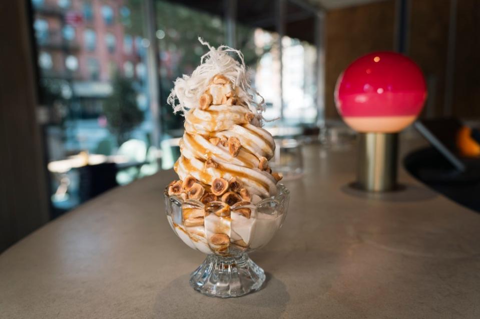 At Shukette in Chelsea, patrons can enjoy a refreshing spire of tahini soft serve topped with hazelnuts, halva floss and pomegranate. Stefano Giovannini for N.Y.Post