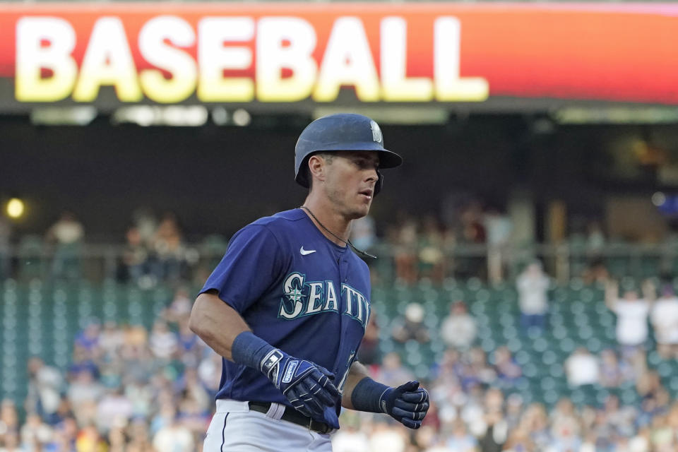 Seattle Mariners' Dylan Moore rounds the bases after hitting a solo home run against the Toronto Blue Jays during the second inning of a baseball game, Thursday, July 7, 2022, in Seattle. (AP Photo/Ted S. Warren)