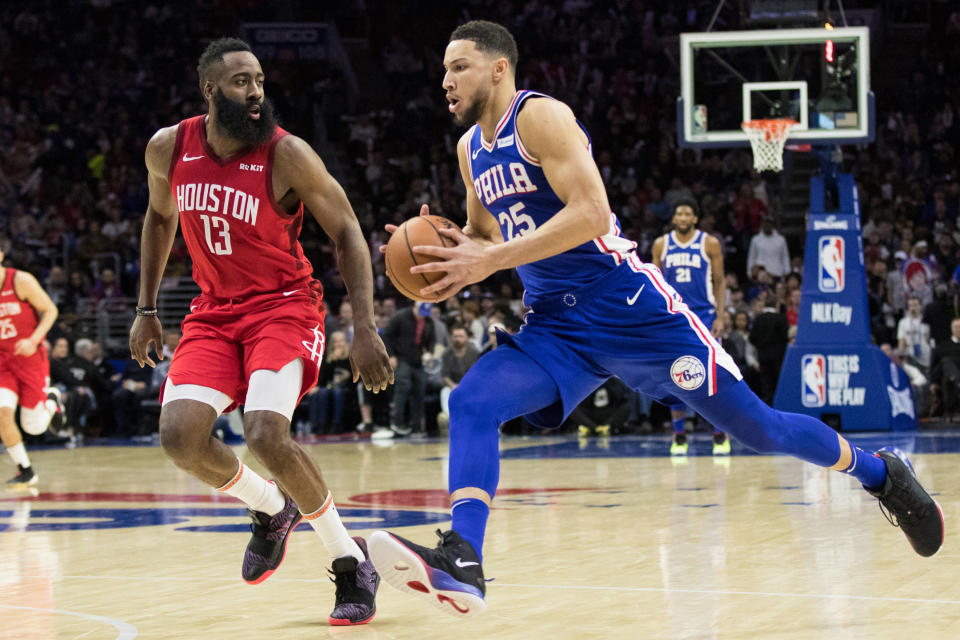 Jan 21, 2019; Philadelphia, PA, USA; Philadelphia 76ers guard Ben Simmons (25) drives against Houston Rockets guard James Harden (13) during the third quarter at Wells Fargo Center. Mandatory Credit: Bill Streicher-USA TODAY Sports