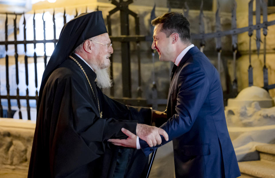 Ukrainian President Volodymyr Zelenskiy, right, greets Ecumenical Patriarch Bartholomew I during their meeting in Kyiv, Ukraine, Saturday, Aug. 21, 2021. Bartholomew I, arrived to Kyiv to mark the 30th anniversary of Ukraine's independence that is celebrated on Aug. 24.(Ukrainian Presidential Press Office via AP)