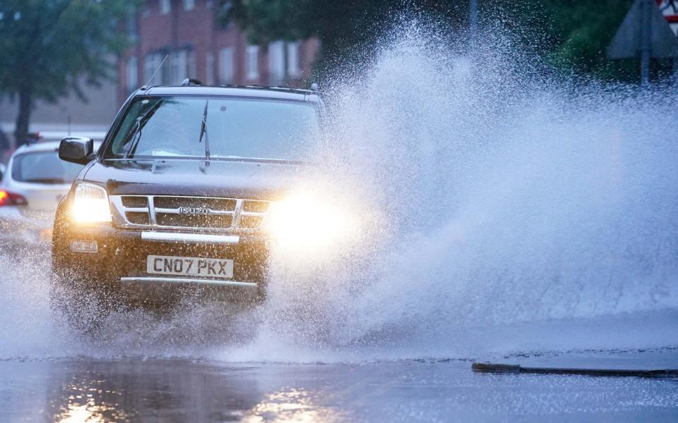 car in water and rain