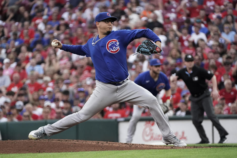 Chicago Cubs starting pitcher Javier Assad delivers to a Cincinnati Reds batter during the second inning of a baseball game Saturday, Sept. 2, 2023, in Cincinnati. (AP Photo/Joshua A. Bickel)