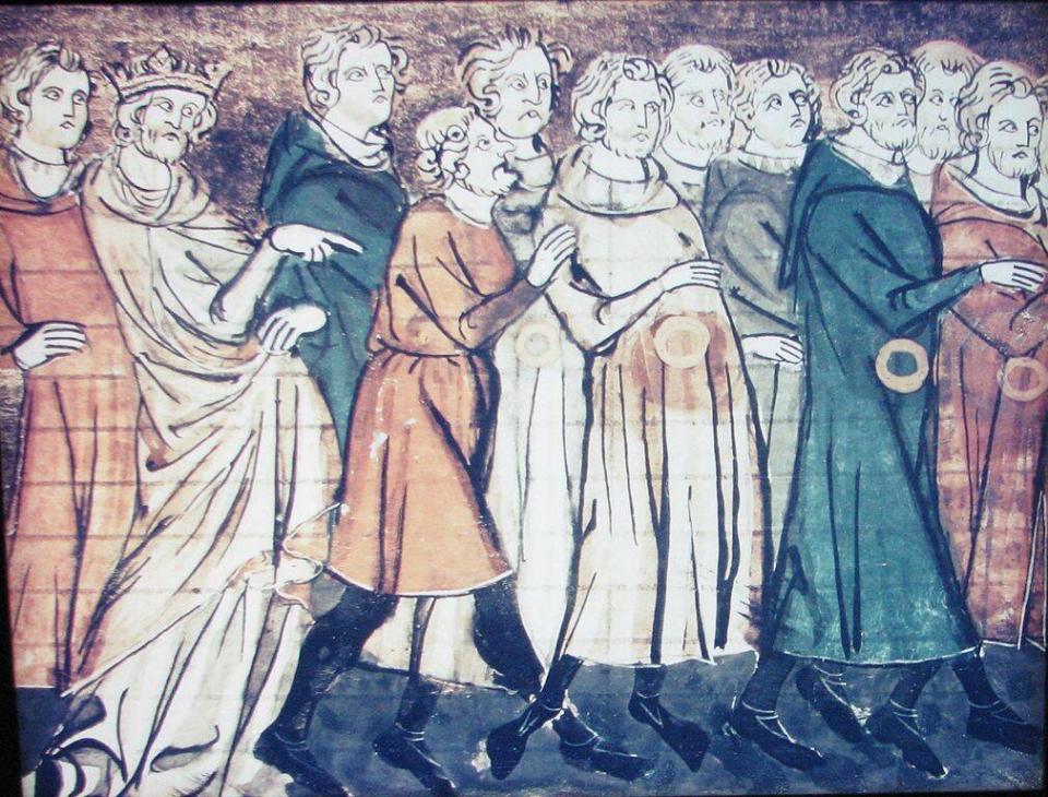 Expulsion des Juifs (portant rouelle à la taille) en 1182. Miniature des Grandes Chroniques de France publiée en 1321. Musée de la Diaspora, Tel Aviv.
