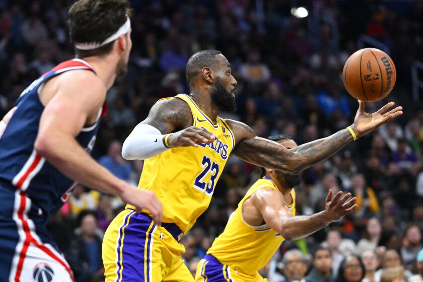 LeBron James grabs a rebound during the first half.