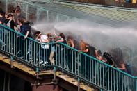 <p>Riot police use water cannon against protesters on July 7, 2017 in Hamburg, northern Germany, where leaders of the world’s top economies gather for a G20 summit. (Photo: Odd Andersen/AFP/Getty Images) </p>