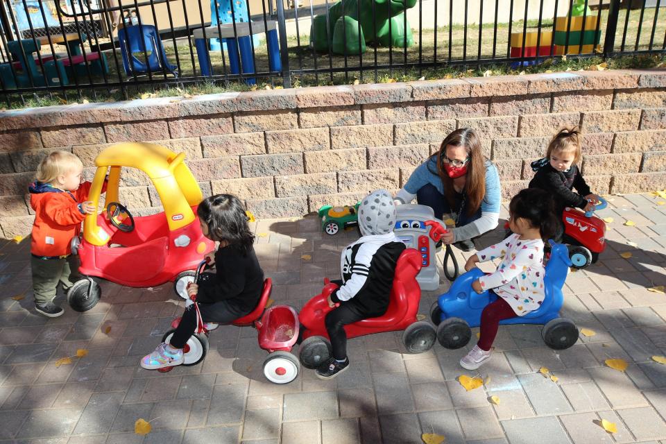 A Gold Star Academy & Child Development Center owner Barbara Tedrow plays with the infants and toddlers on Nov. 5 at its location on 1115 N. Auburn Ave. in Farmington.