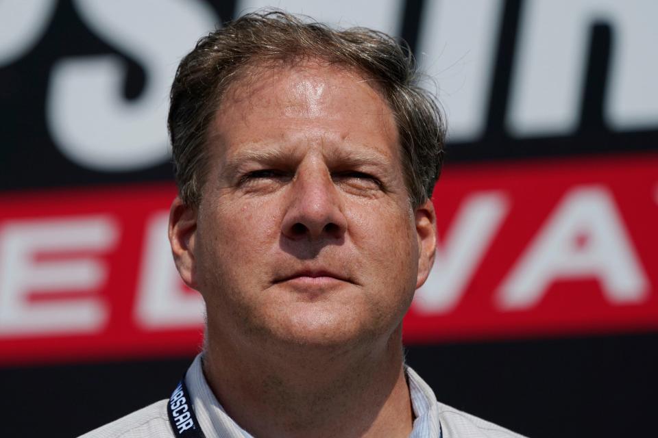 New Hampshire Gov. Chris Sununu seen during driver introductions prior to an auto race at the New Hampshire Motor Speedway, Sunday, July 17, 2022, is a former ski resort executive. A recent controversy at a county-owned ski area has raised questions about his grip on the Republican Party heading into the November elections.