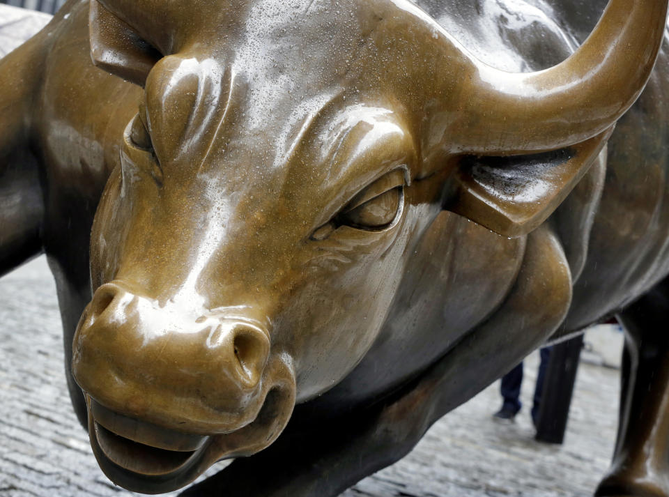 FILE - This Feb. 7, 2018 file photo shows The Charging Bull sculpture by Arturo Di Modica, in New York's Financial District. The bull market for U.S. stocks is now 10 years old and the longest since World War II. That lifespan speaks to financial markets' resiliency in the face of a variety of shocks, including a brutal fourth quarter of 2018. (AP Photo/Richard Drew, File)