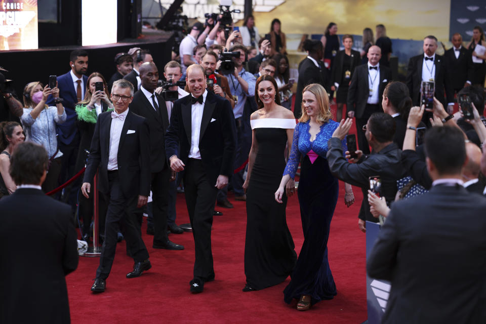 Britain's Prince William, center left, and Kate, Duchess of Cambridge, center right, attend the 'Top Gun Maverick' UK premiere at a central London cinema, on Thursday, May 19, 2022. (Dan Kitwood/Pool via AP)