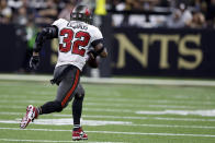 Tampa Bay Buccaneers safety Mike Edwards returns an interception for a touchdown against the New Orleans Saints during the second half of an NFL football game in New Orleans, Sunday, Sept. 18, 2022. (AP Photo/Butch Dill)