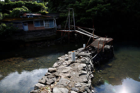 A house where Kazuko Egoshita, one of the first people to be officially recognised as victims of Minamata disease, used to live stands in Minamata, Japan, September 12, 2017. REUTERS/Kim Kyung-Hoon