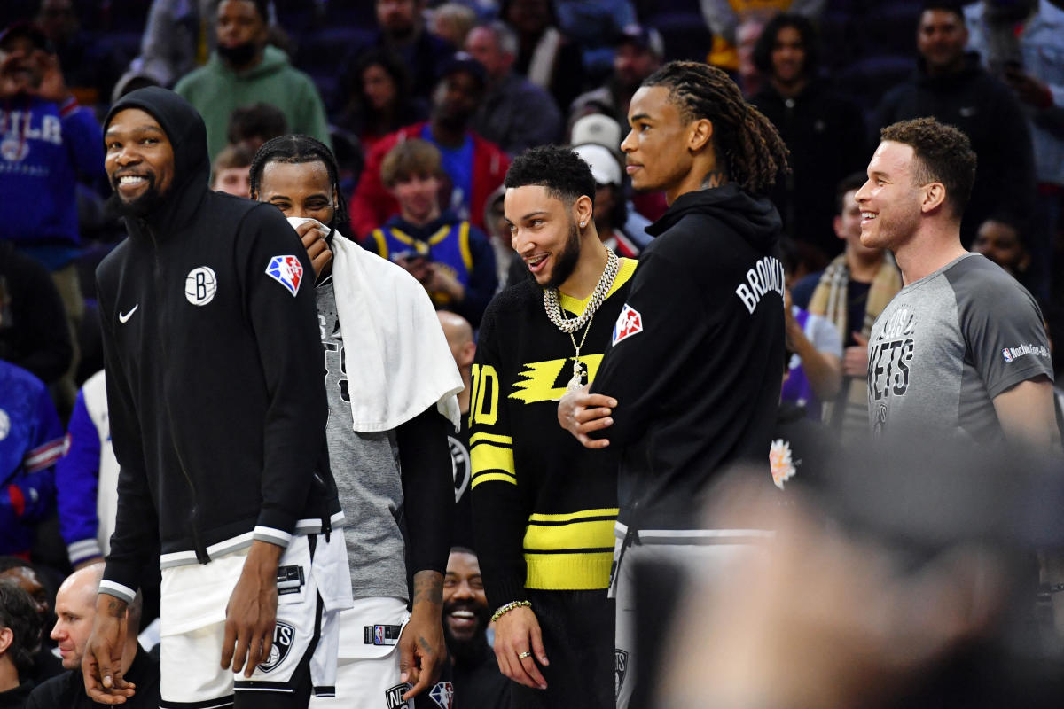 A fan shops for souvenirs before a preseason NBA basketball game between  the Philadelphia 76ers and the Toronto Raptors, Thursday, Oct. 7, 2021, in  Philadelphia. Ben Simmons was out of sight, out