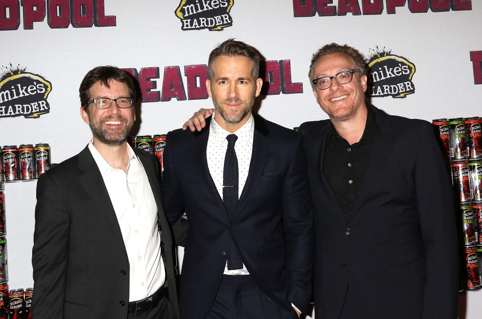 NEW YORK, NY - FEBRUARY 08:  Rhett Reese, Ryan Reynolds and Paul Wernick attend "Deadpool" Fan Event at AMC Empire Theatre on February 8, 2016 in New York City.  (Photo by Laura Cavanaugh/FilmMagic)