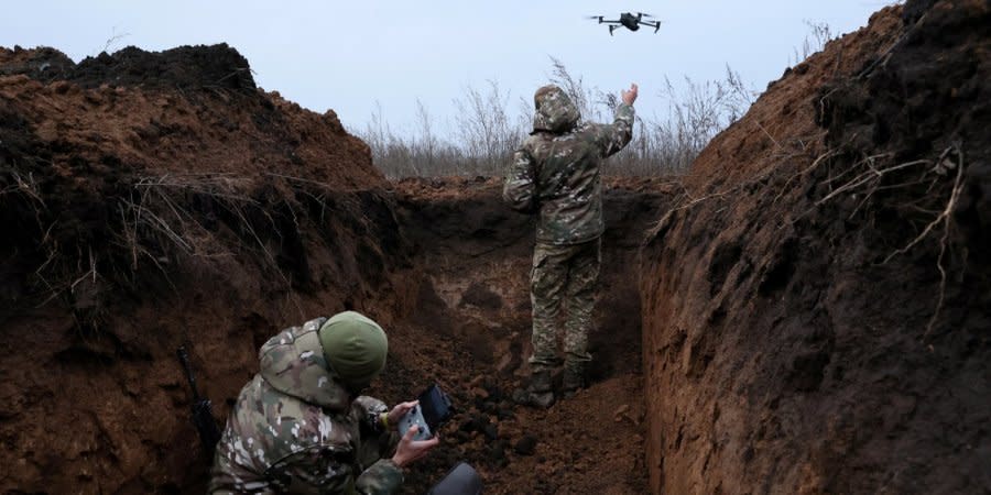 Ukrainian military launches a drone in a trench near Bakhmut