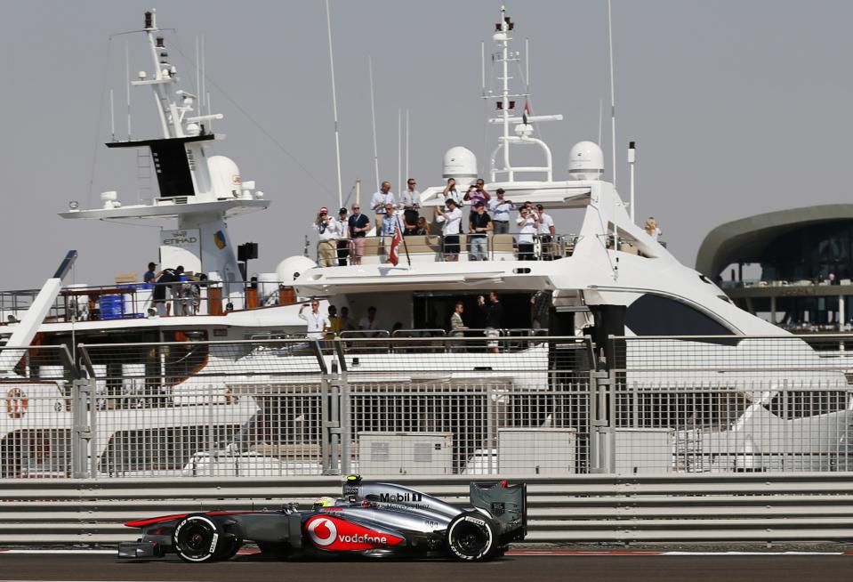 McLaren Formula One driver Sergio Perez of Mexico drives during the third practice session of the Abu Dhabi F1 Grand Prix at the Yas Marina Circuit in Abu Dhabi November 2, 2013. REUTERS/Steve Crisp (UNITED ARAB EMIRATES - Tags: SPORT MOTORSPORT F1)