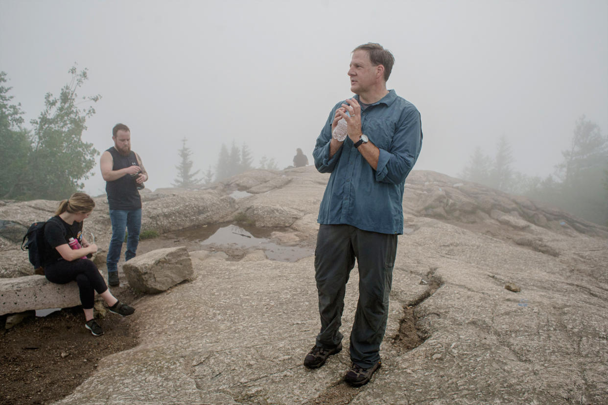 New Hampshire Gov. Chris Sununu at the summit of Mount Major in Alton, N.H., on July 15, 2021. (John Tully / for NBC News)
