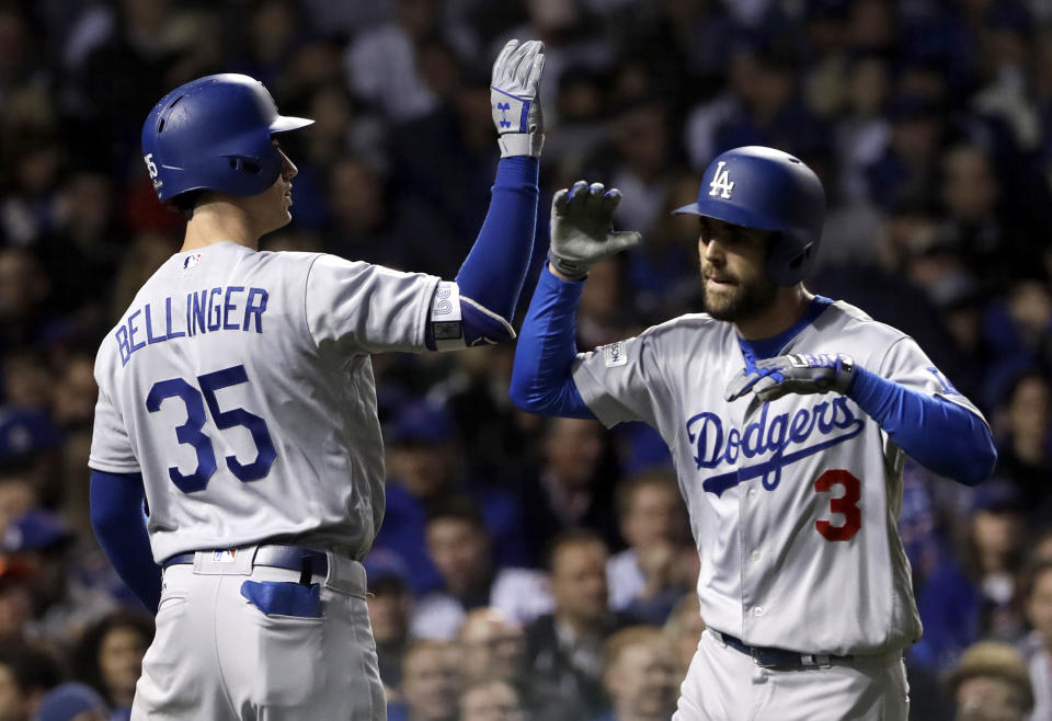 Los Angeles Dodgers’ Chris Taylor (3) celebrates his home run with Cody Bellinger (35) during the third inning of Game 3 of baseball’s National League Championship Series against the Chicago Cubs, Tuesday, Oct. 17, 2017, in Chicago. (AP)