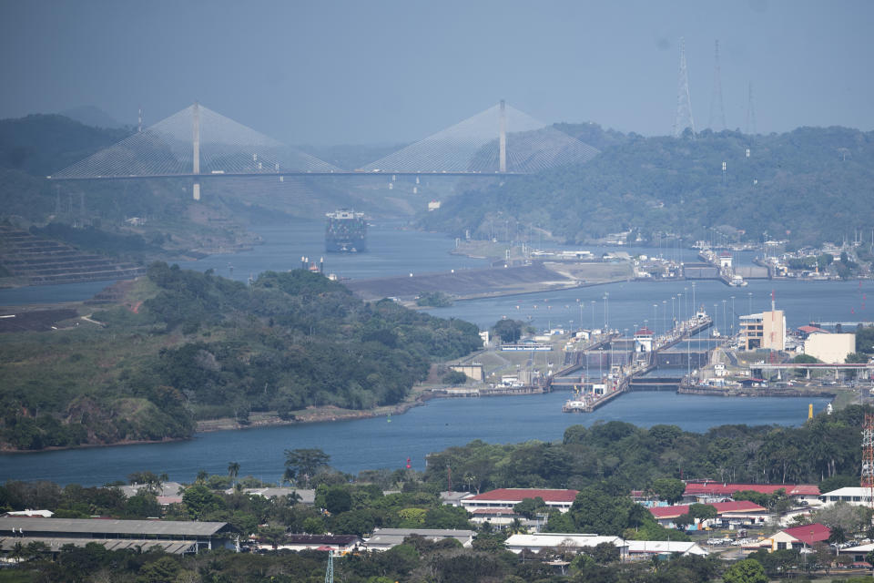 File - A cargo ship waits near the Centennial Bridge for transit through the Panama Canal locks in Panama City on Jan. 17, 2024. Passage through the canal, a crucial trade corridor, is restricted by low water levels caused by drought. (AP Photo/Agustin Herrera, File)