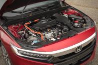 <p><a rel="nofollow noopener" href="https://www.caranddriver.com/reviews/2018-honda-accord-hybrid-fuel-efficient" target="_blank" data-ylk="slk:The hybrid's 42 mpg on our highway fuel-economy loop;elm:context_link;itc:0;sec:content-canvas" class="link ">The hybrid's 42 mpg on our highway fuel-economy loop</a> is as much an achievement as the punchy turbocharged 2.0-liter's <a rel="nofollow noopener" href="https://www.caranddriver.com/reviews/2018-honda-accord-20t-automatic-test-review" target="_blank" data-ylk="slk:5.5-second streak to 60 mph;elm:context_link;itc:0;sec:content-canvas" class="link ">5.5-second streak to 60 mph</a>.</p>