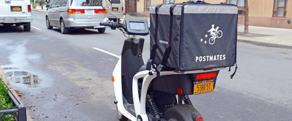 NEW YORK CIRCA MARCH 2018. Postmates delivery bicycle in Manhattan, a food service delivery company that works via mobile phone app which has tried to build a presence in the east coast.