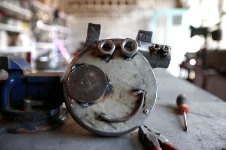 An uncompleted sculpture depicting animated series character Peppa Pig, made of an air blower, is seen at Geng Shuai's workshop in Yangcun village of Baoding, Hebei province, China January 22, 2019. REUTERS/Jason Lee