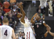 Arizona forward Rondae Hollis-Jefferson, center left, looks for the ball after San Diego State forward Skylar Spencer knocked it away during the second half of a regional semifinal in the NCAA men's college basketball tournament, Thursday, March 27, 2014, in Anaheim, Calif. (AP Photo/Mark J. Terrill)