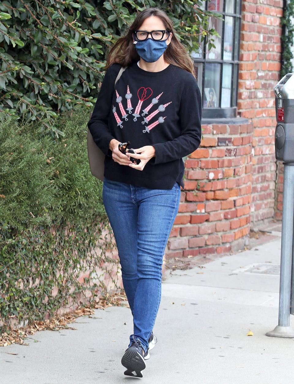 <p>Jennifer Garner dons a festive sweatshirt for an errand run in Los Angeles on Thursday.</p>