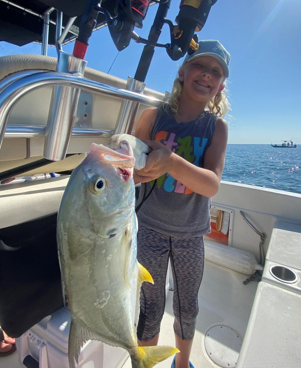 9-year-old Susan Reger won the battle last week and brought this bulky jack to the boat, just outside of Ponce Inlet.