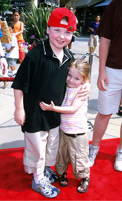 Spencer Breslin and his smaller sibling at the Orange County premiere of Disney's The Kid
