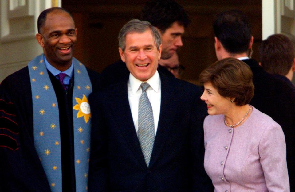 George W. Bush stands with his wife Laura and&nbsp;Rev. Kirbyjon H. Caldwell after services at Tarrytown United Methodist Church in Austin, Texas, on&nbsp;Dec. 14, 2000. Caldwell&nbsp;has long been a spiritual&nbsp;adviser to Bush. (Photo: Reuters Photographer / Reuters)