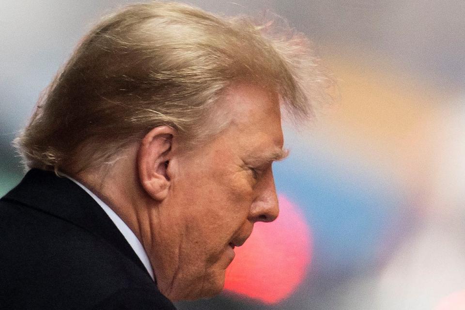 Donald Trump is pictured leaving a federal courthouse in Manhattan during a trial to determine damages owed to E Jean Carroll for his defamatary statements. (Reuters)