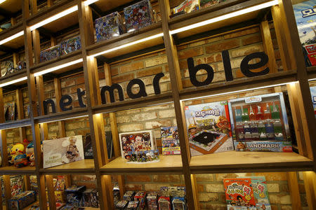 FILE PHOTO: The logo of Netmarble Games is seen at its headquarters in Seoul, South Korea, March 25, 2016. REUTERS/Kim Hong-Ji/File Photo