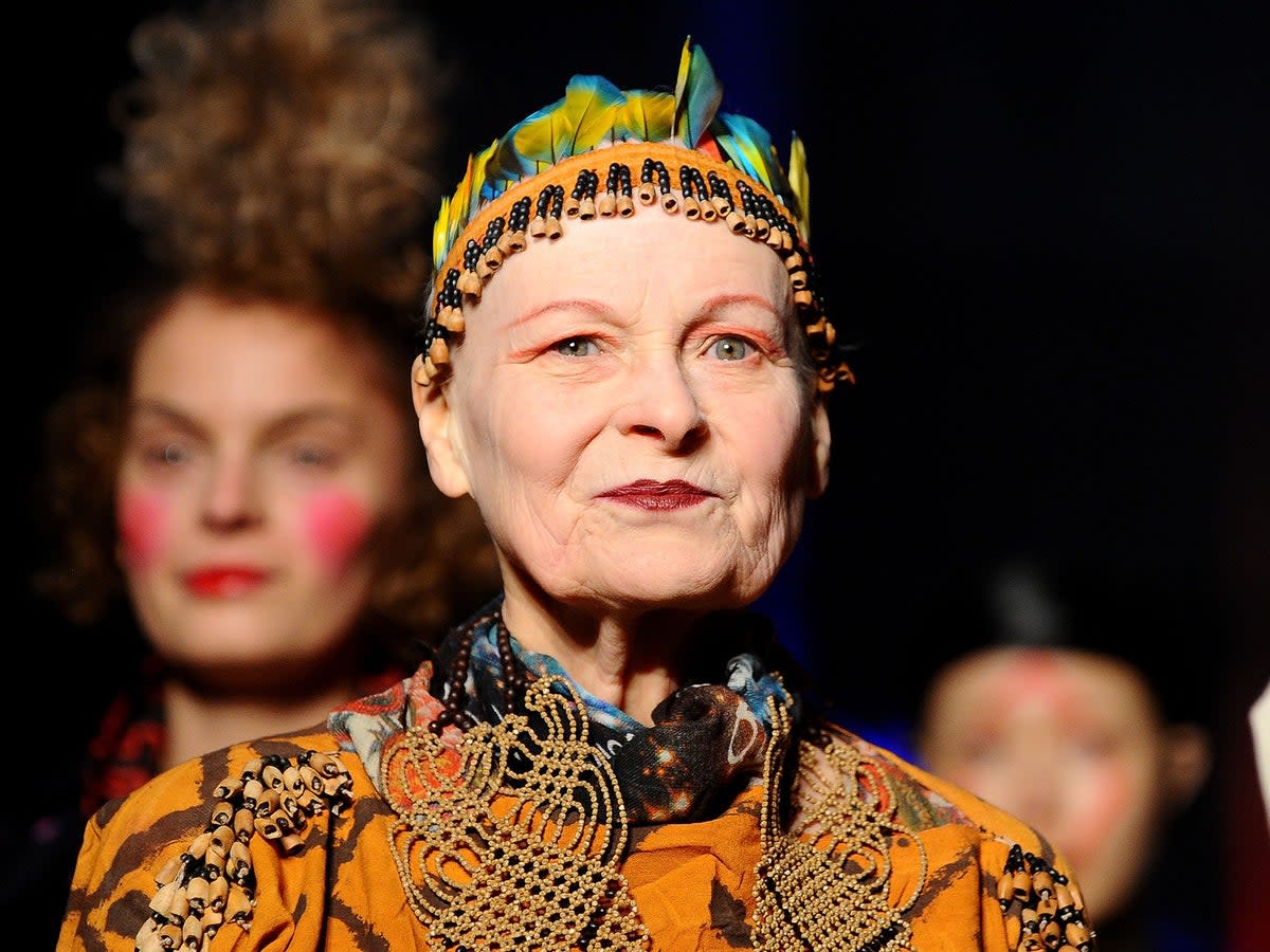 Walking the runway during her autumn/winter show at Paris Fashion Week in March 2014 (Getty)