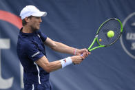 Andreas Seppi, of Italy, returns a shot against Yasutaka Uchiyama, of Japan, during a match in the Citi Open tennis tournament, Monday, Aug. 2, 2021, in Washington. (AP Photo/Nick Wass)