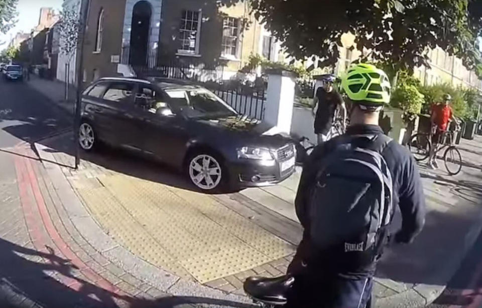 A motorist was caught on camera driving towards a group of cyclists in London (Picture: Dave Clifton/PA)