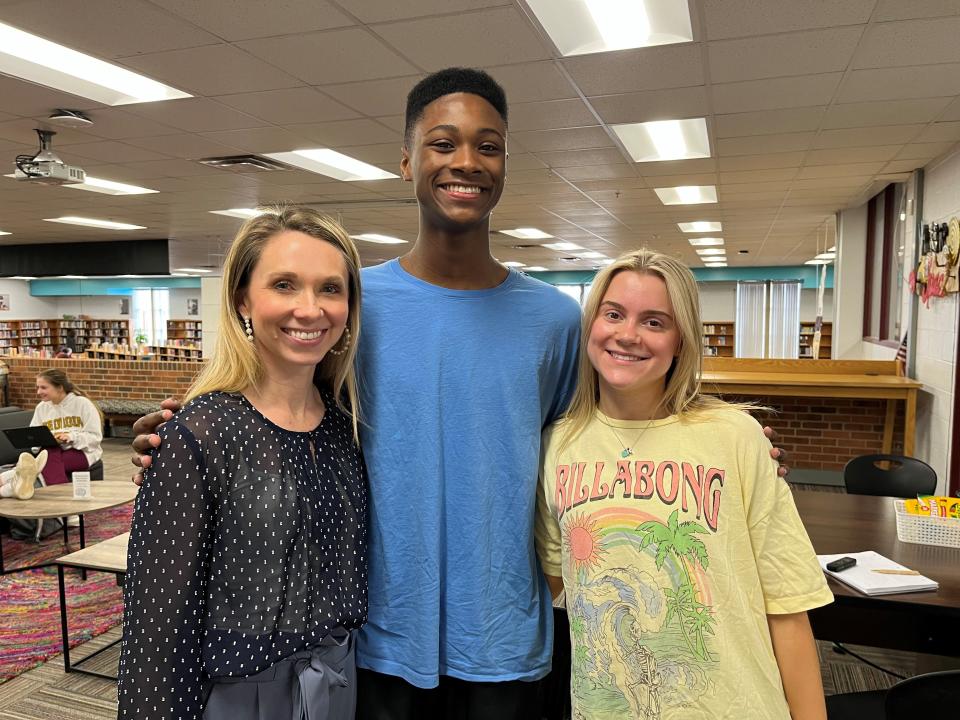 Knox County Schools Teacher of the Year Rebecca Nutter is shown with Bearden dance team members Jordan James, center, and Ruby Fisher at the school in February.