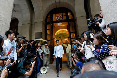 Pro-democracy activist Nathan Law walks out of the Final Court of Appeal after being granted bail in Hong Kong, China October 24, 2017. REUTERS/Bobby Yip