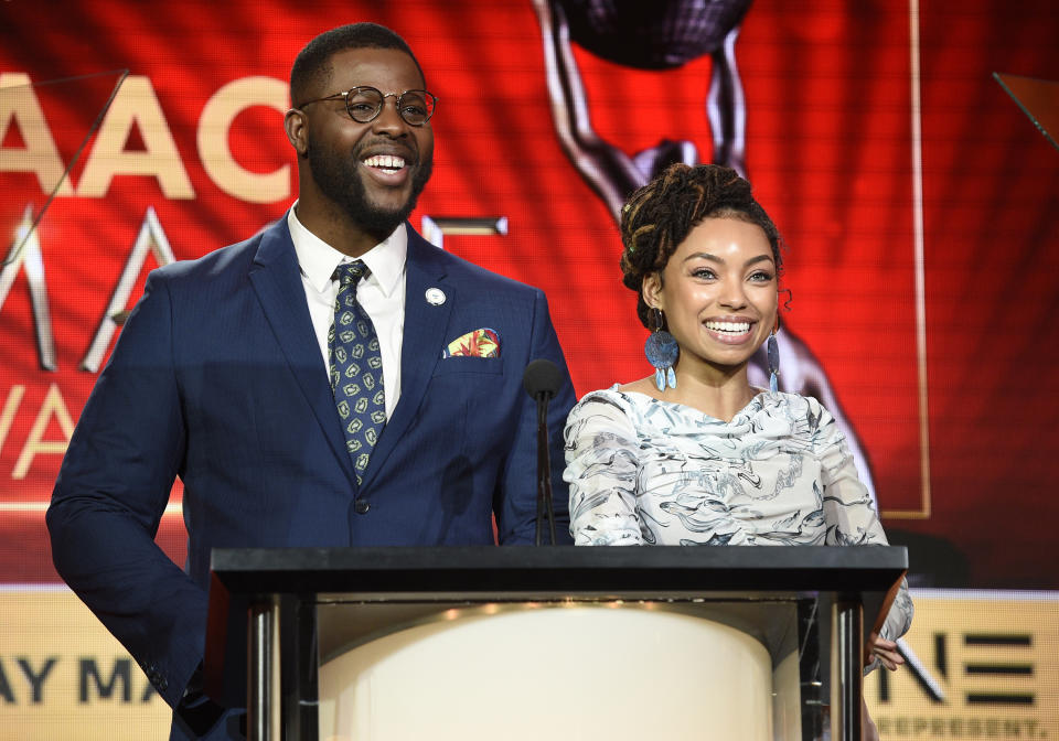 Winston Duke, left, and Logan Browning announce nominations for the 50th annual NAACP Image Awards during TV One's Winter Television Critics Association Press Tour on Wednesday, Feb. 13, 2019, in Pasadena, Calif. (Photo by Chris Pizzello/Invision/AP)