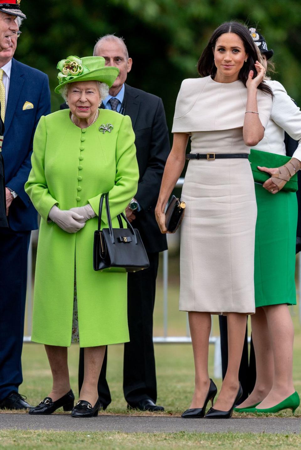 <p>Meghan joined the Queen for her first royal engagement without Prince Harry and while her Majesty opted for bright green, Meghan again chose a nude dress by <a href="https://www.cosmopolitan.com/uk/fashion/celebrity/a21439579/meghan-markle-queen-engagement-pale-pink-dress/" rel="nofollow noopener" target="_blank" data-ylk="slk:Givenchy;elm:context_link;itc:0;sec:content-canvas" class="link ">Givenchy</a>.</p>