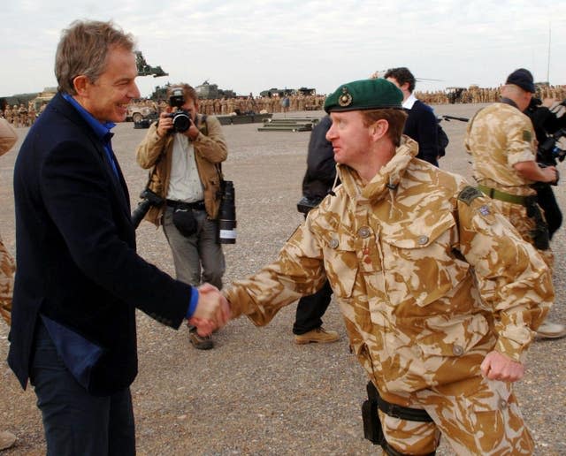 Tony Blair pictured making a surprise visit to Afghanistan when prime minister