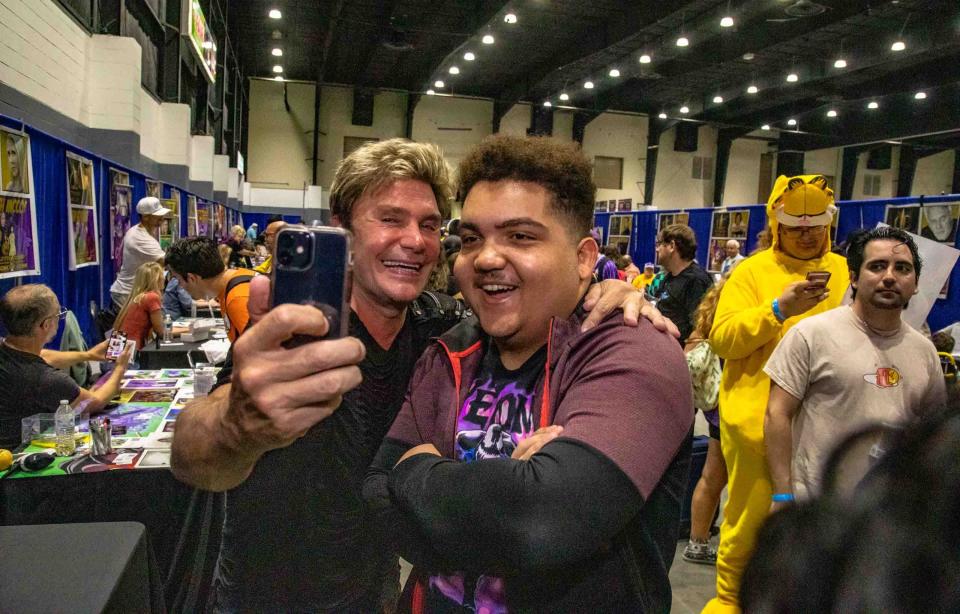 Vic Mignova (l), an American voice actor and musician known for his voice-over work in the English dubs of Japanese anime shows, takes a selfie with Lake Worth resident Matthew Richert during the Ultracon Comic Con event at the South Florida Fairgrounds Expo Center on Saturday August 26, 2023.