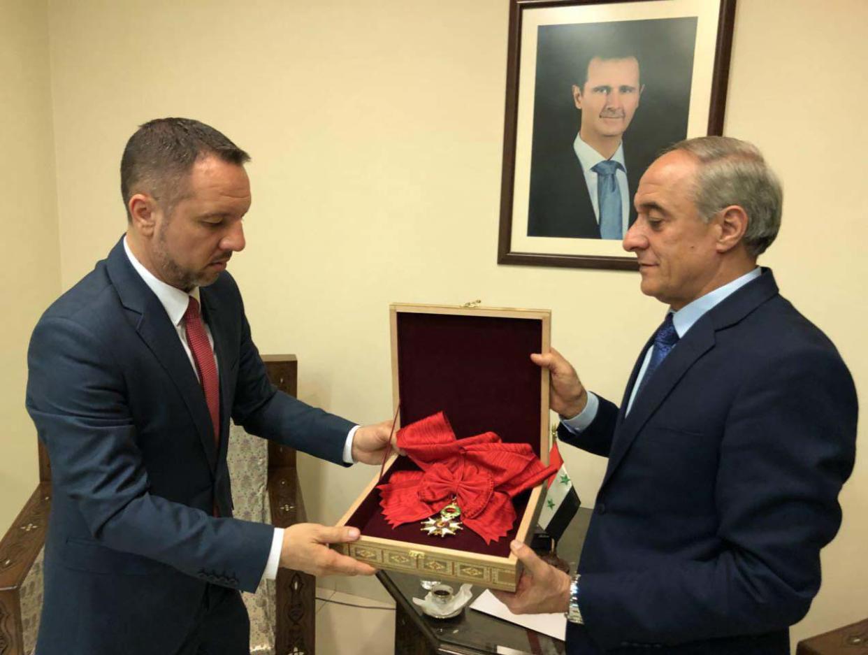 Bashar al-Assad's Legion d'honneur award is handed back to France via the Romanian embassy: Facebook