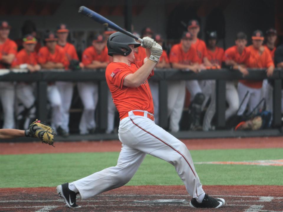 Taunton's Ryan MacDougall hits a double during an MIAA Division I Round of 16 game against Springfield Central.