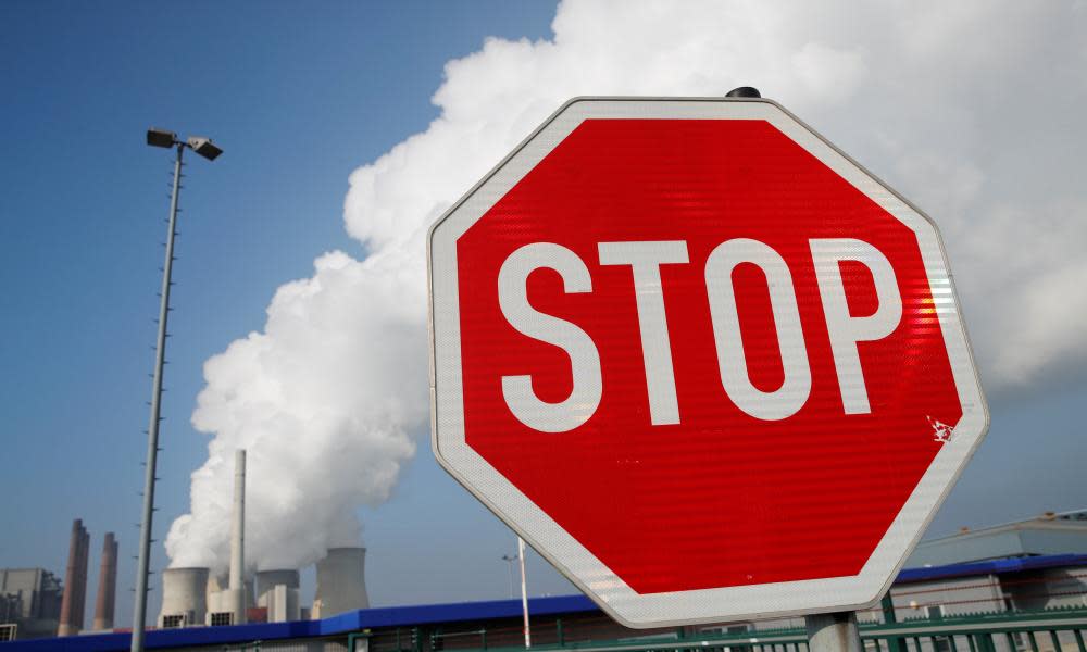 A stop sign in front of RWE coal power plant in Neurath, Germany, 3 November 2017. 